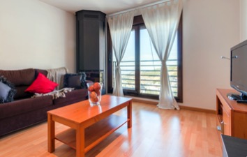 Salón publicado en la categoría Habitat Premier. La unidad concreta se confirma en la propuesta.